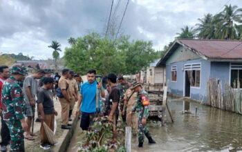 Pulihkan Desa Lalong, TNI Gelar Karya Bakti Bersama Pemerintah dan Masyarakat